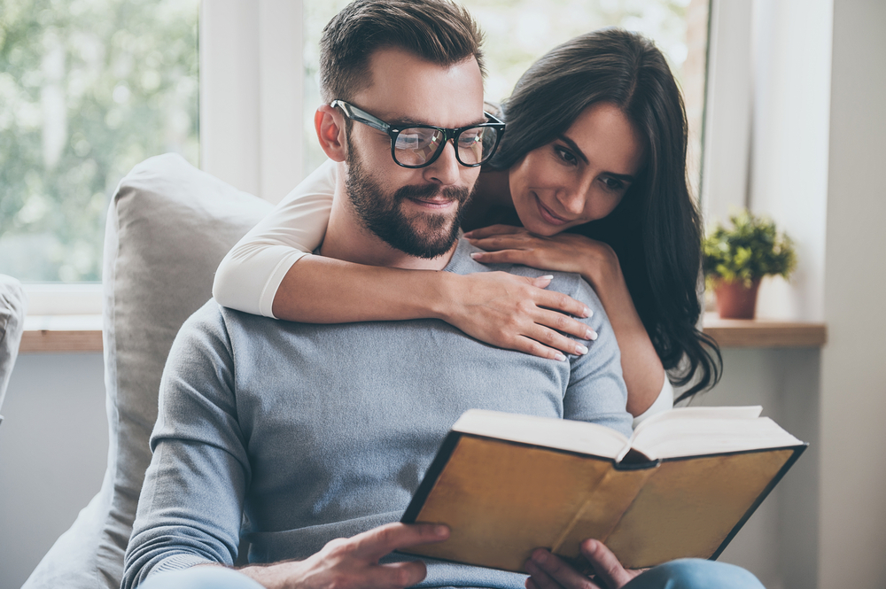 Reading,Their,Favorite,Book.,Beautiful,Young,Woman,Bonding,To,Her sapiosexual