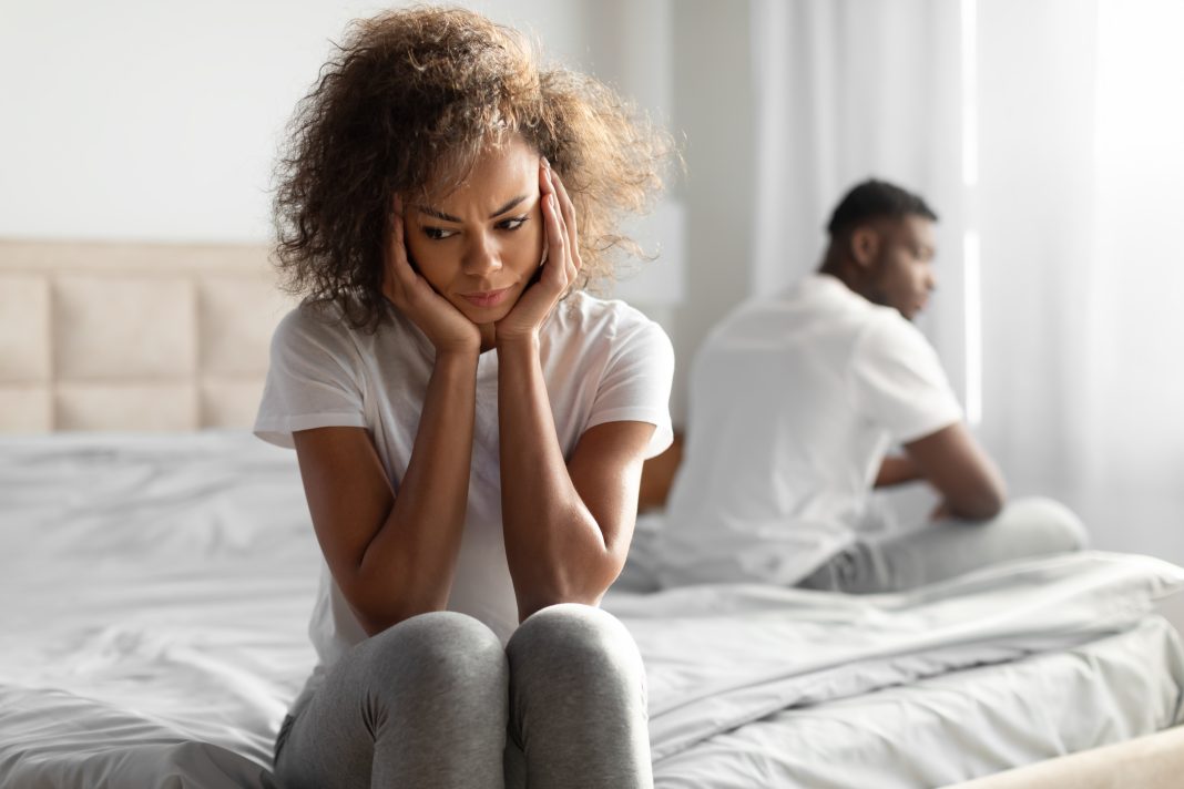 Marital,Crisis.,Unhappy,Black,Young,Couple,Sitting,On,Different,Sides masturbacion